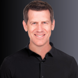Professional portrait of Justin Shriber.