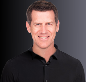 Professional portrait of Justin Shriber.