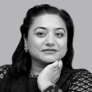 Malvika Gupta professional headshot in black and white color