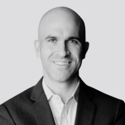 Black and white headshot of Jon Adams from Ontra