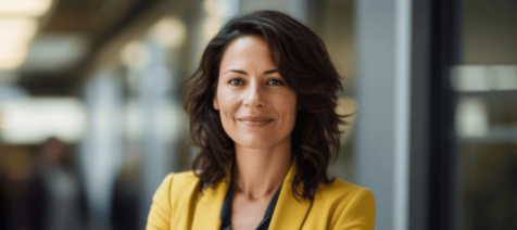 Woman professionally dressed with yellow suit