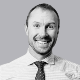 John Stecher headshot in black and white