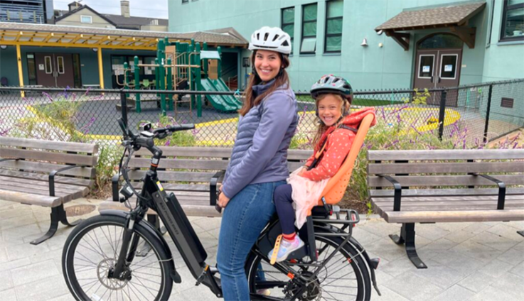 Ontra employee Leah Chapman riding bicycle