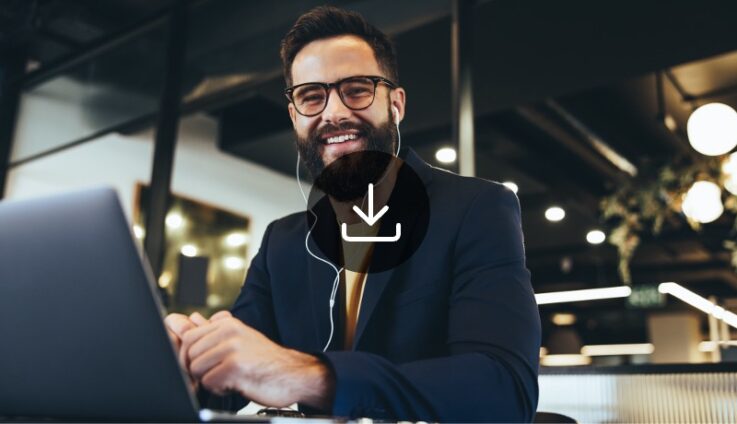 A man wearing earphones smiling