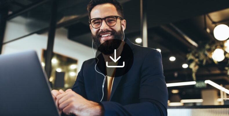 A man wearing earphones smiling