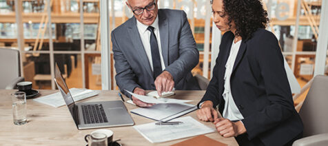 Man and woman reviewing a document