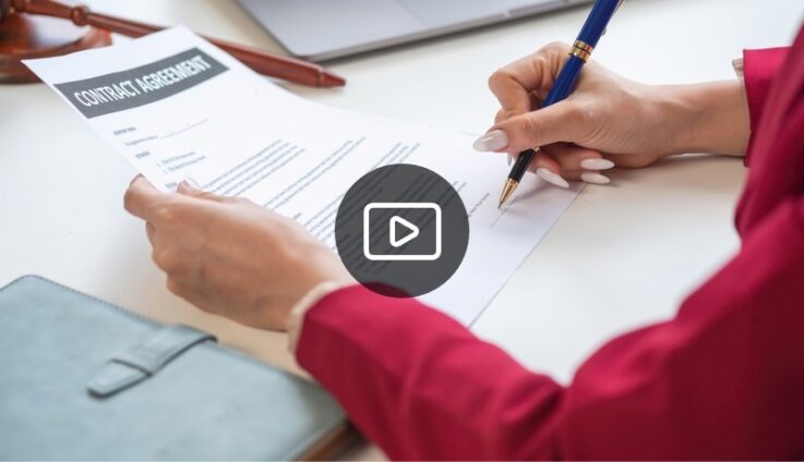 Woman signing a contract