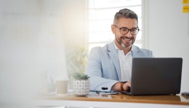 Man typing on a computer