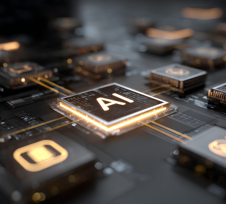 A black computer circuit board with warm white lights throughout and the word 