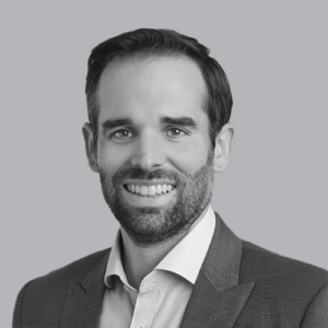Professional headshot of Matt Katz in black and white for the AI Done Right Webinar